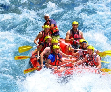 Side: Thrilling Rafting Adventure Nature's Pulse in Every Paddle